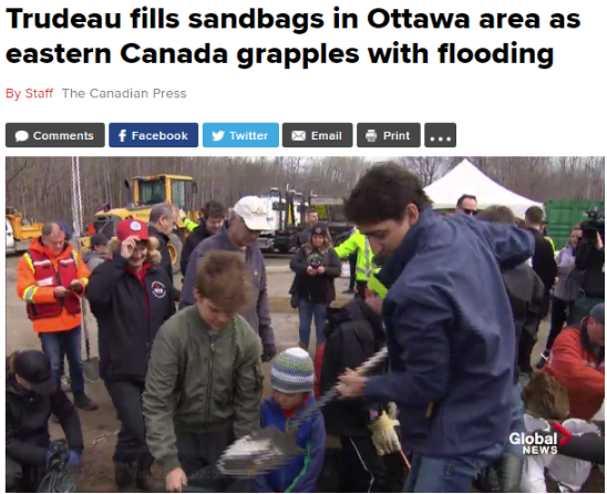 加拿大首都百年一遇洪灾 特鲁多拿起铁锹填沙袋