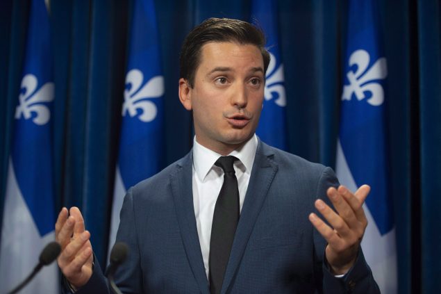 魁北克政府在压力下取消移民新规定