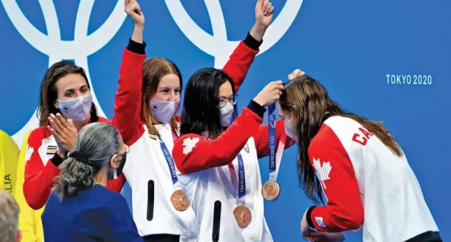 中国弃婴首战奥运拿一金两铜 她获7枚奖牌创纪录