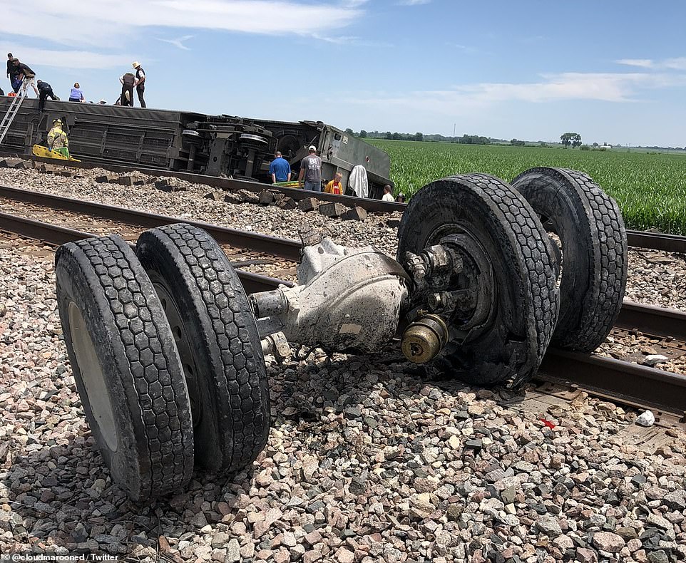 A broken truck axle was photographed close to the track in the aftermath. It's still unclear why the truck was in the crossing