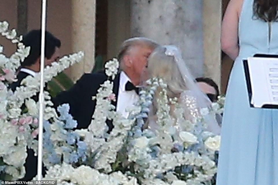 The former president could be seen giving his daughter a quick kiss as he left her in the hands of her groom